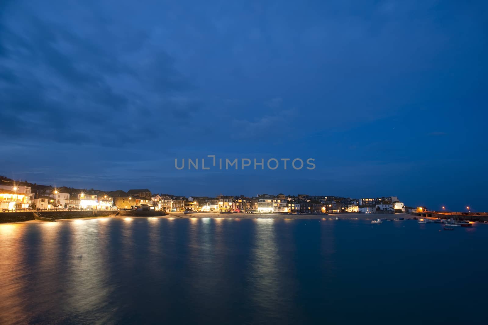 Scenic view of St Ives, Cornwall at night by stockarch