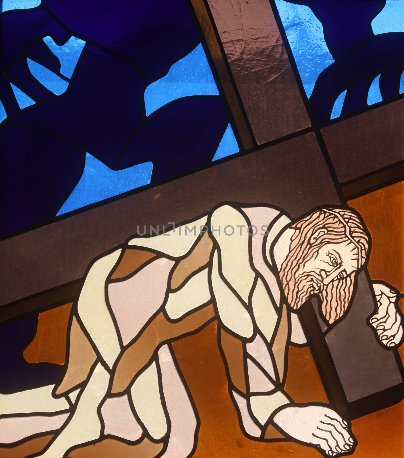 3rd Station of the Cross, Jesus falls the first time, stained-glass window in the church of St. John the Baptist in Rijeka, Croatia