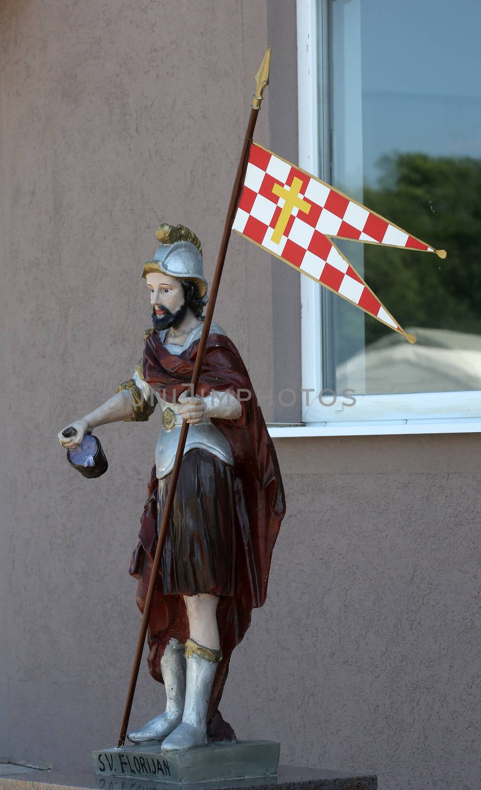 The statue of St. Florian patron of firefighters in front of the fire department Kosnica in Petina, Croatia
