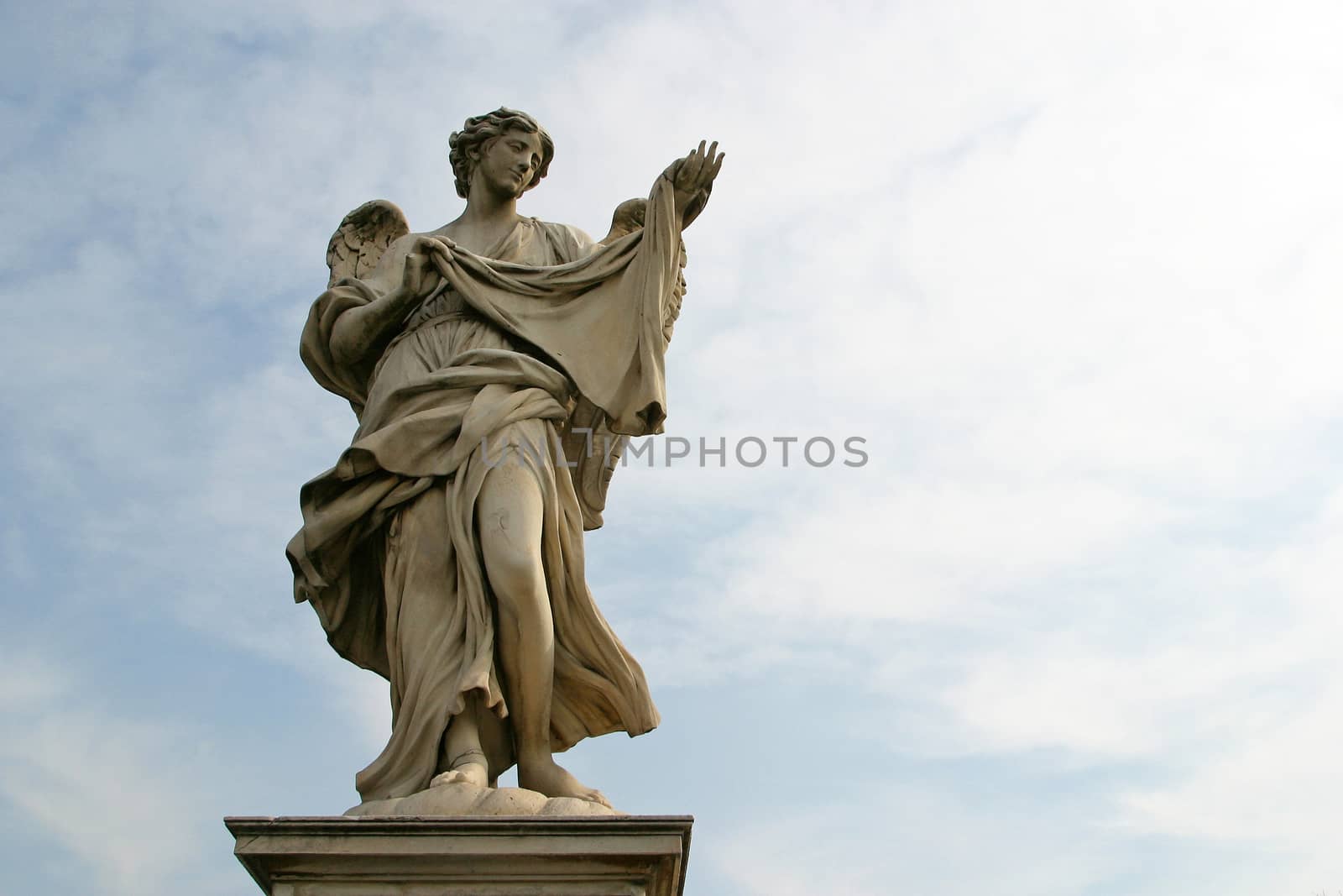 Bernini's angel along the Holy Angel bridge near the Hadrian Mausoleum in Rome, Italy