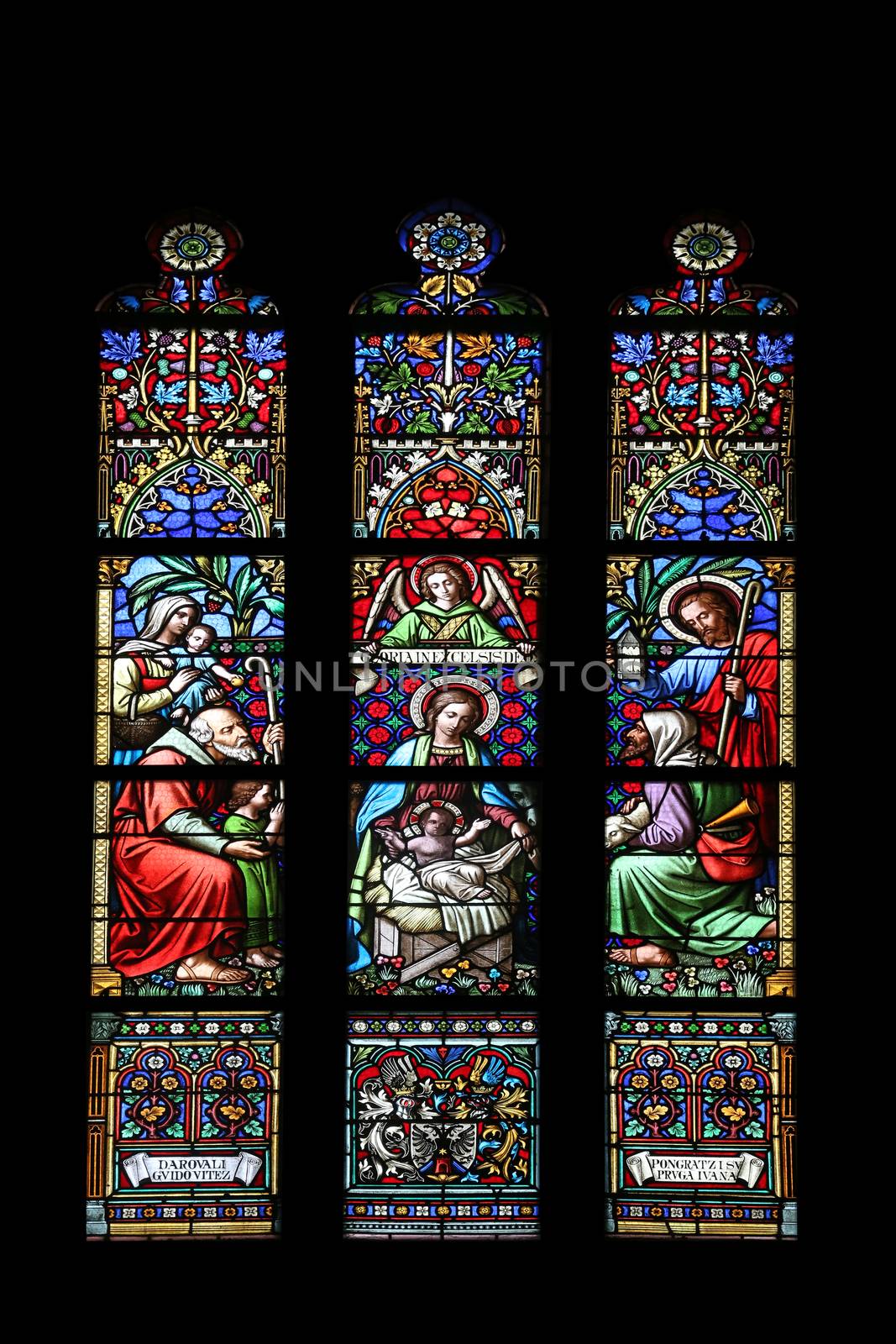 Nativity Scene, Adoration of the Shepherds, stained glass window in parish church of Saint Mark in Zagreb, Croatia