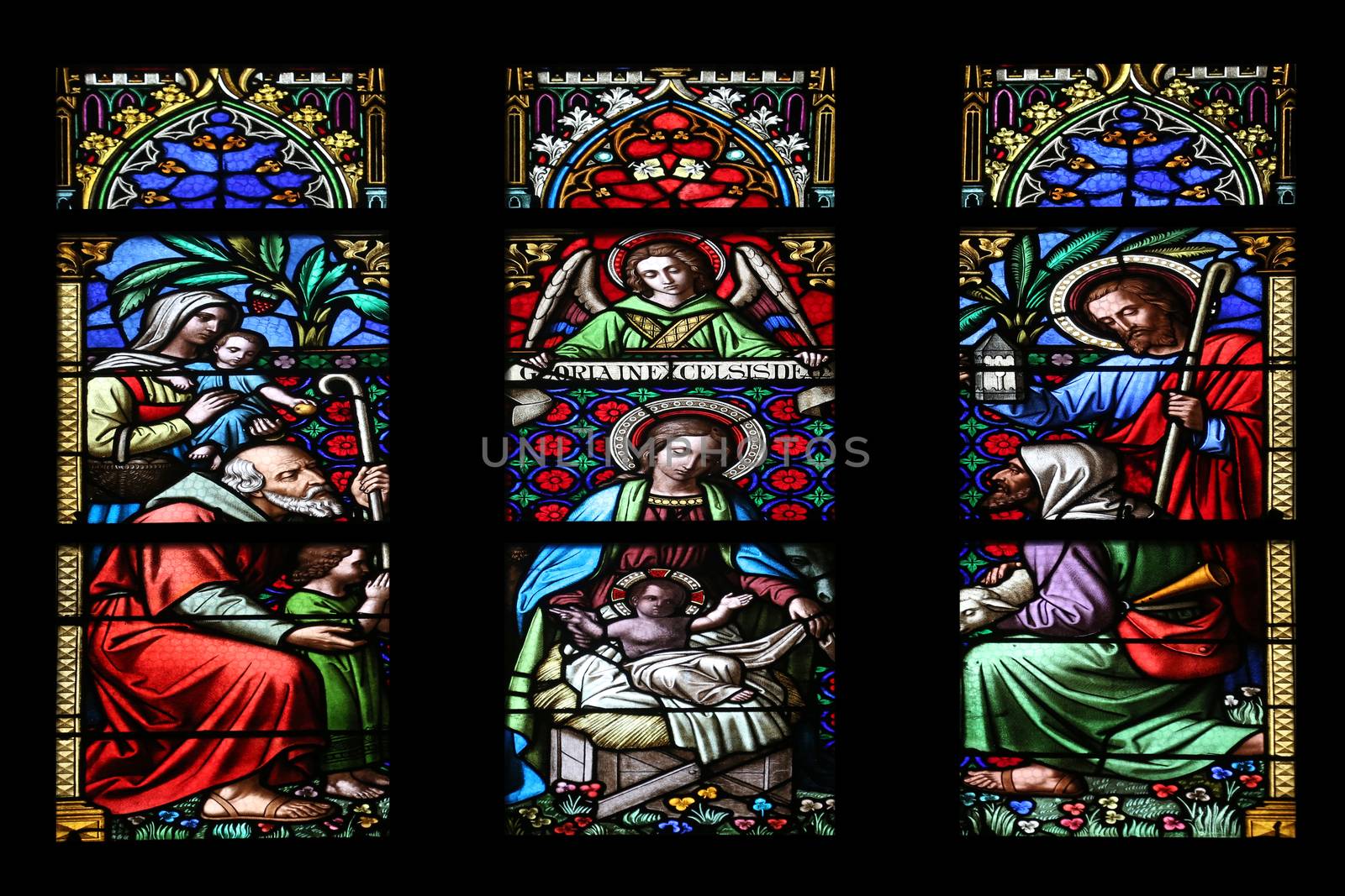 Nativity Scene, Adoration of the Shepherds, stained glass window in parish church of Saint Mark in Zagreb, Croatia