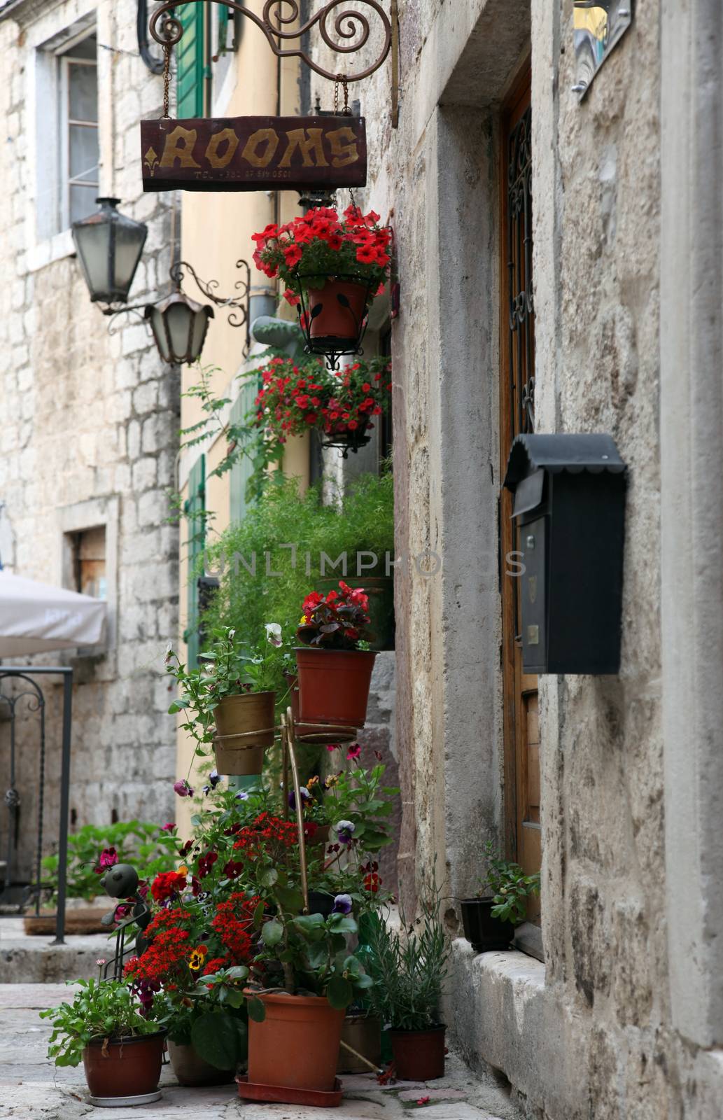 Mediterranean house with flowers in Kotor, Montenegro by atlas