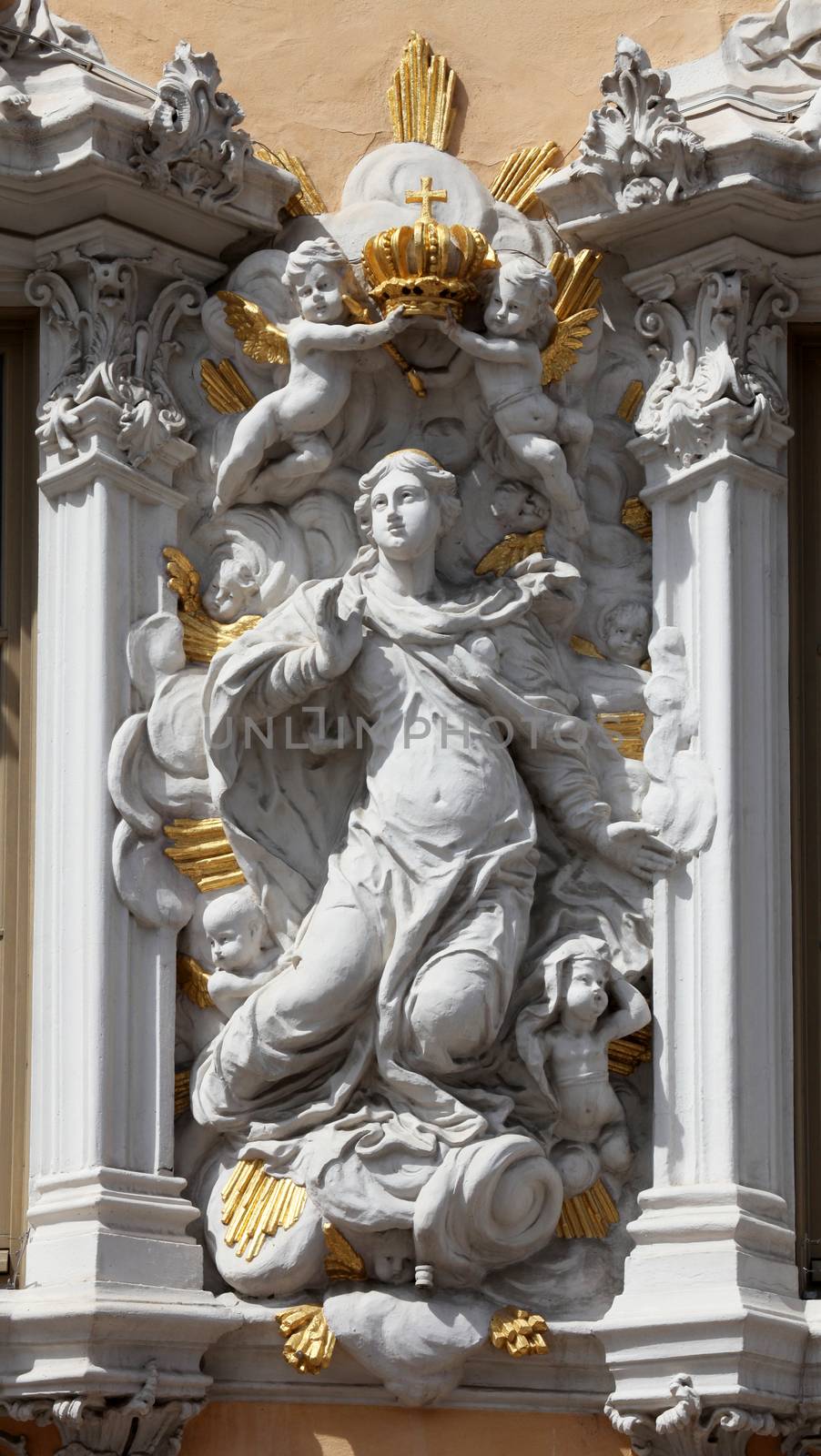 Virgin Mary, House of Falcon, the finest Rococo style building in the city in Wurzburg, Germany