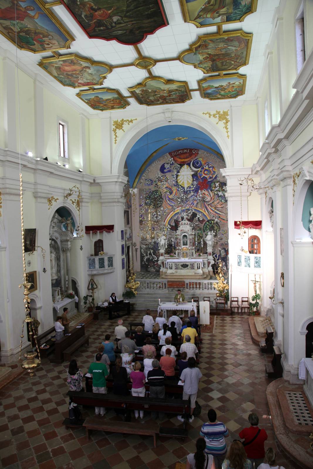 Mass for pilgrims in the Catholic Church Saint Eustache in Dobrota, Montenegro by atlas