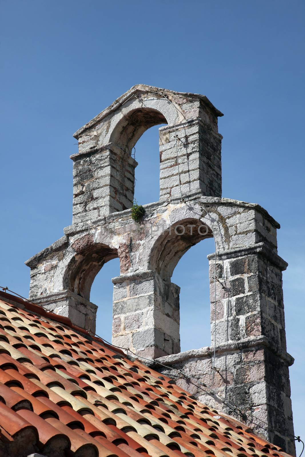 The bell tower of the church of Saint Mary in Punta, Budva, Montenegro
