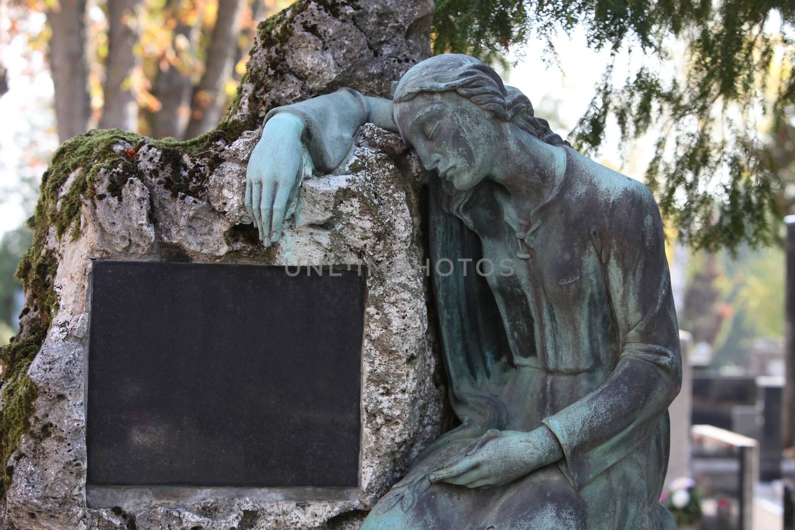 Detail of a mourning sculpture on a Mirogoj cemetery in Zagreb, Croatia