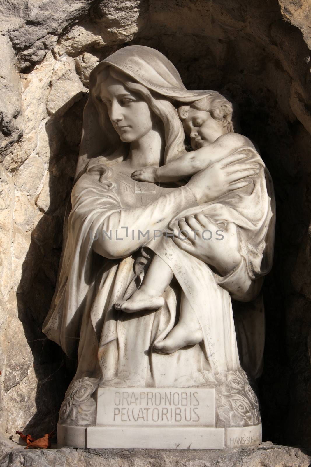 Madonna with Child, detail of a mourning sculpture on a Mirogoj cemetery in Zagreb, Croatia
