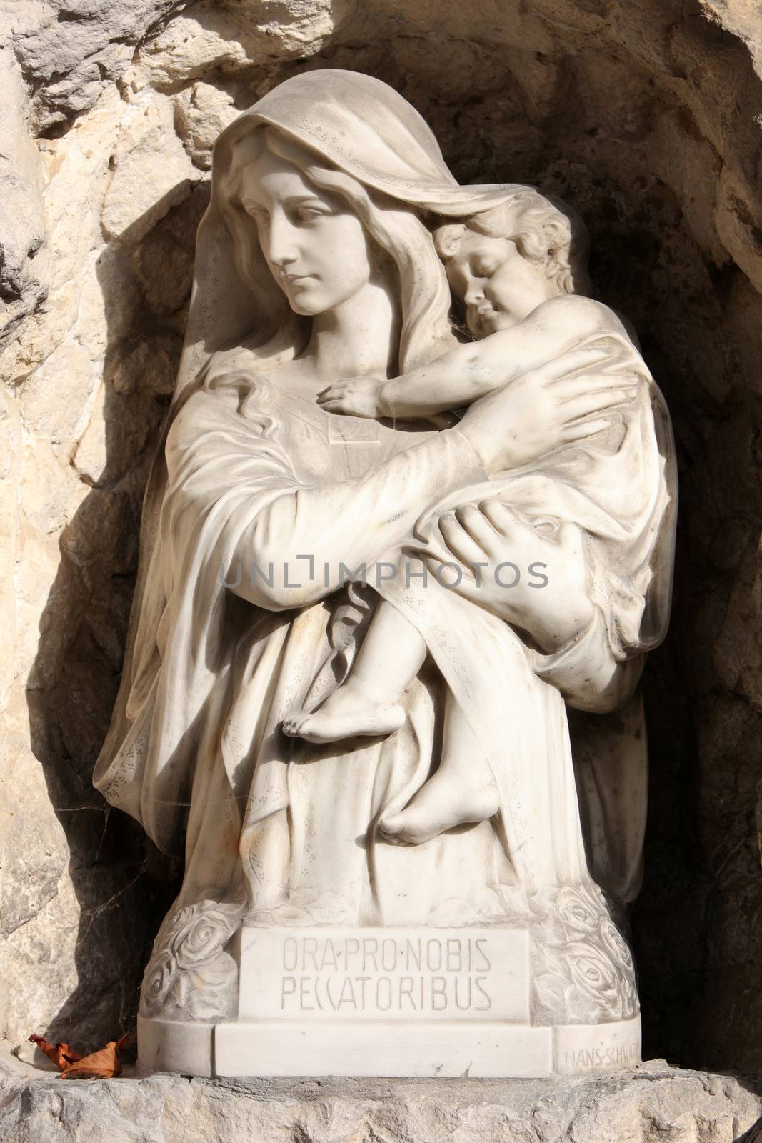 Madonna with Child, detail of a mourning sculpture on a Mirogoj cemetery in Zagreb, Croatia