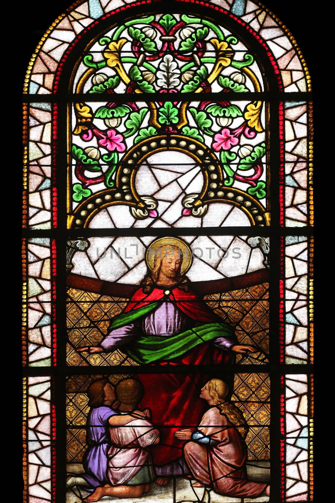 Jesus friend of children, stained glass window in the Church of St. Vincent de Paul in Zagreb, Croatia