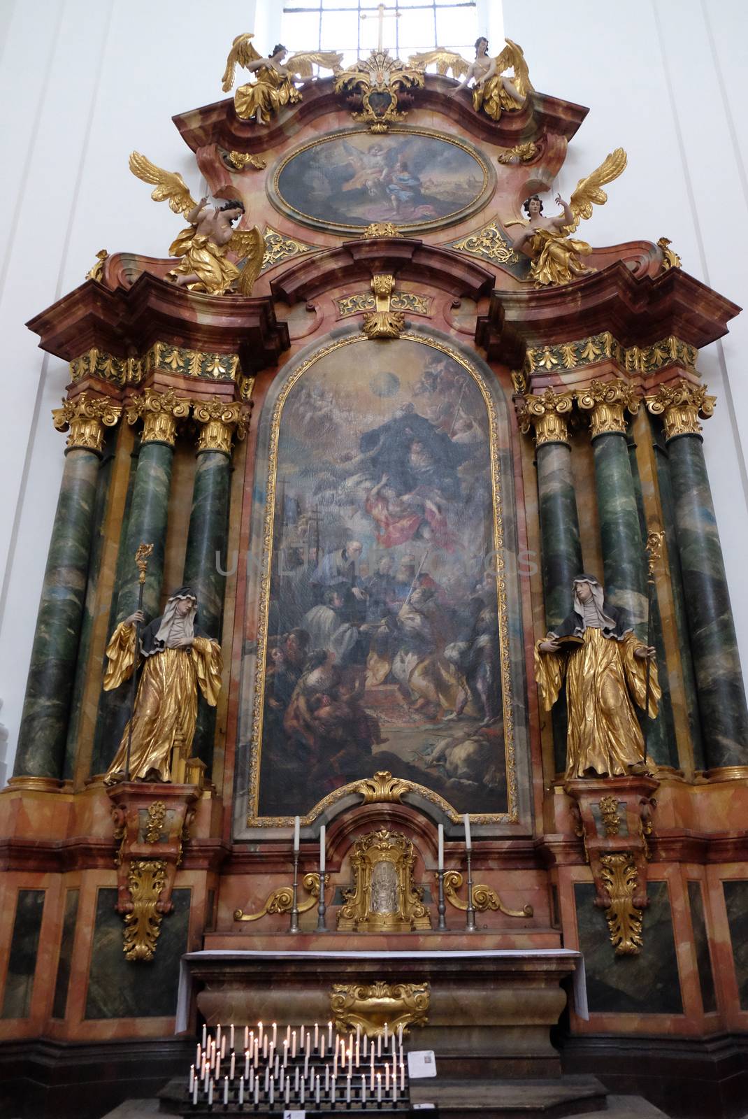 Altar in Collegiate church in Salzburg by atlas