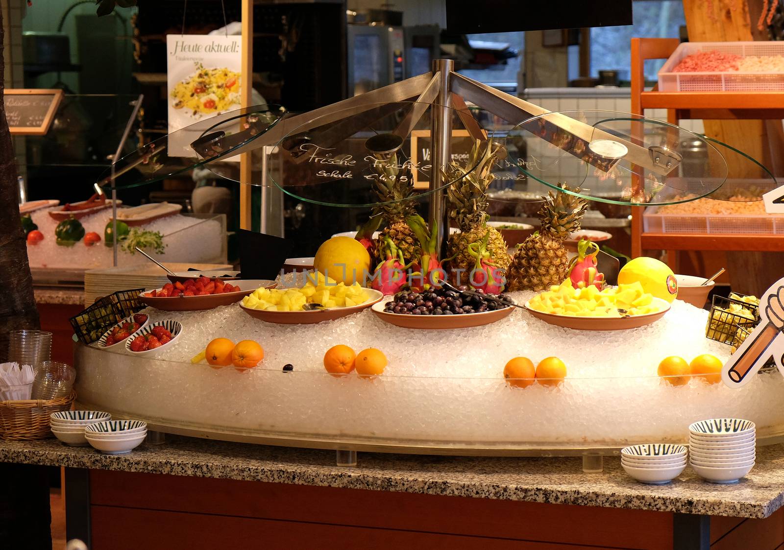 Fruits on restaurant display by atlas