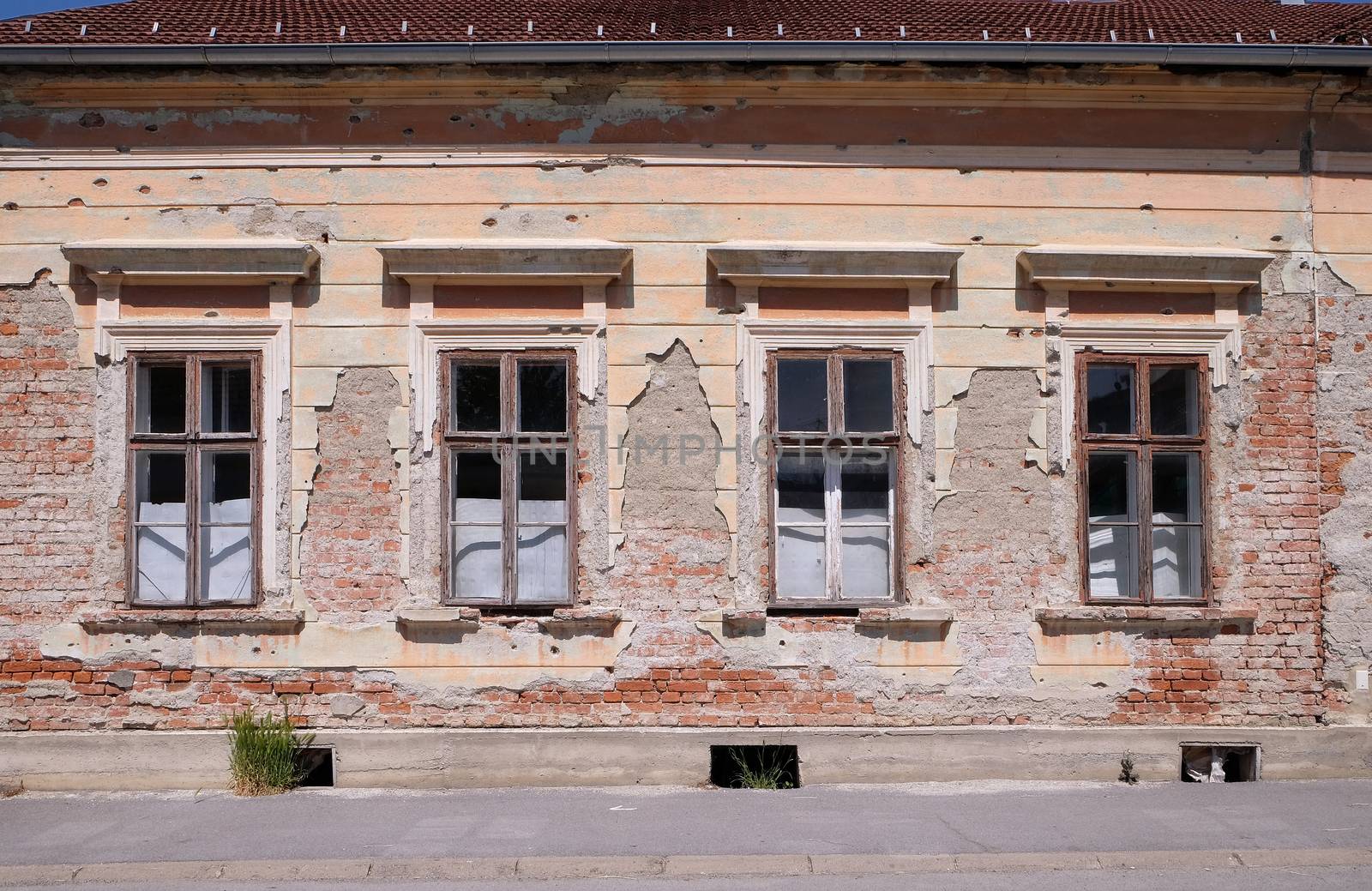 Destroyed house as war aftermath. The Croatian War of Independence was fought from 1991 to 1995 in Pakrac, Croatia by atlas