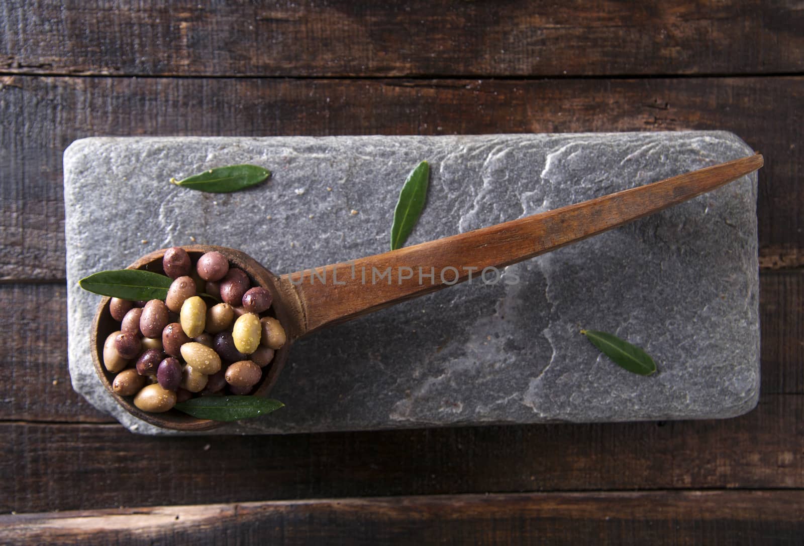 Mixed olives in brine by fotografiche.eu