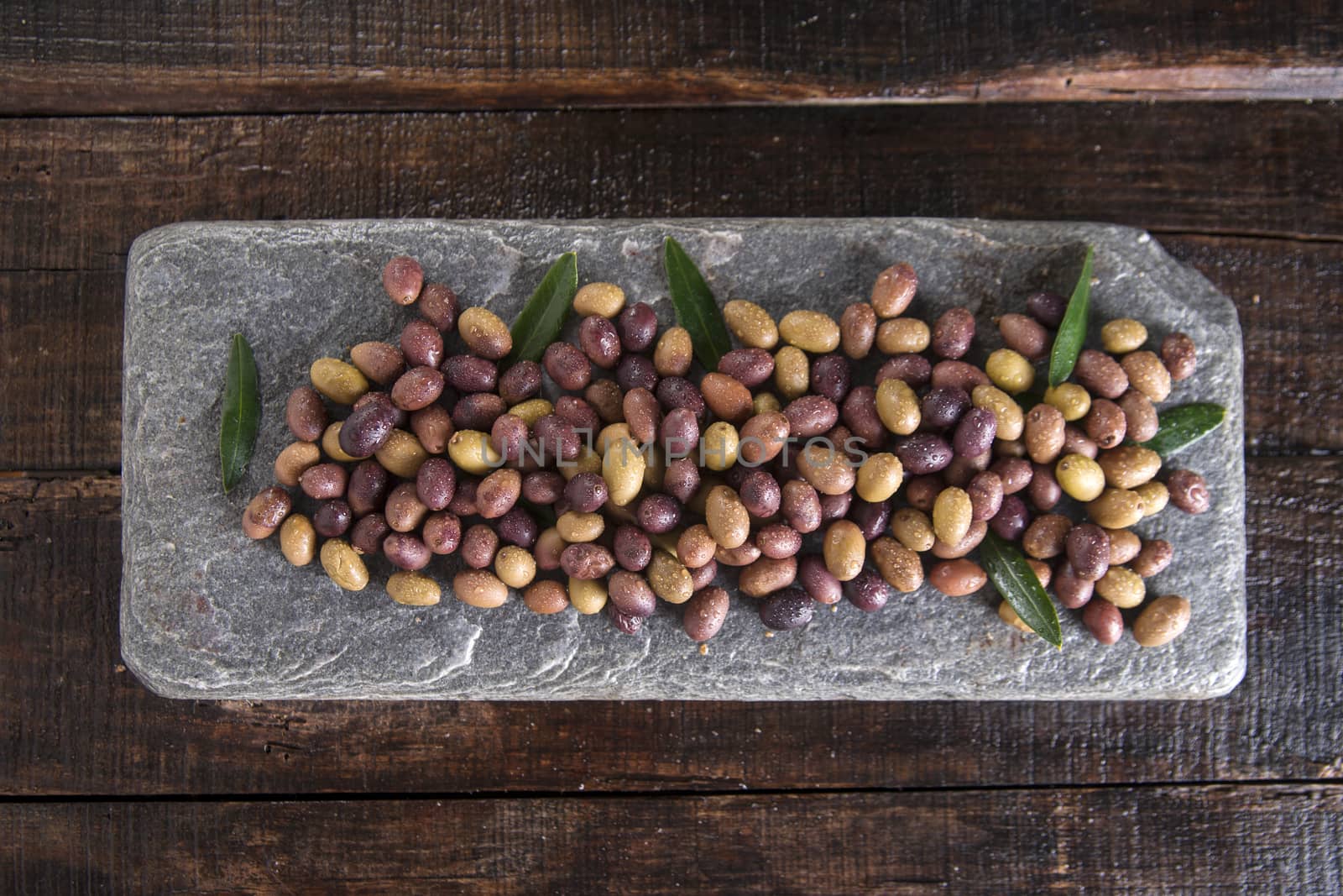 Aperitif with mixed olives in brine of Tuscany Italy