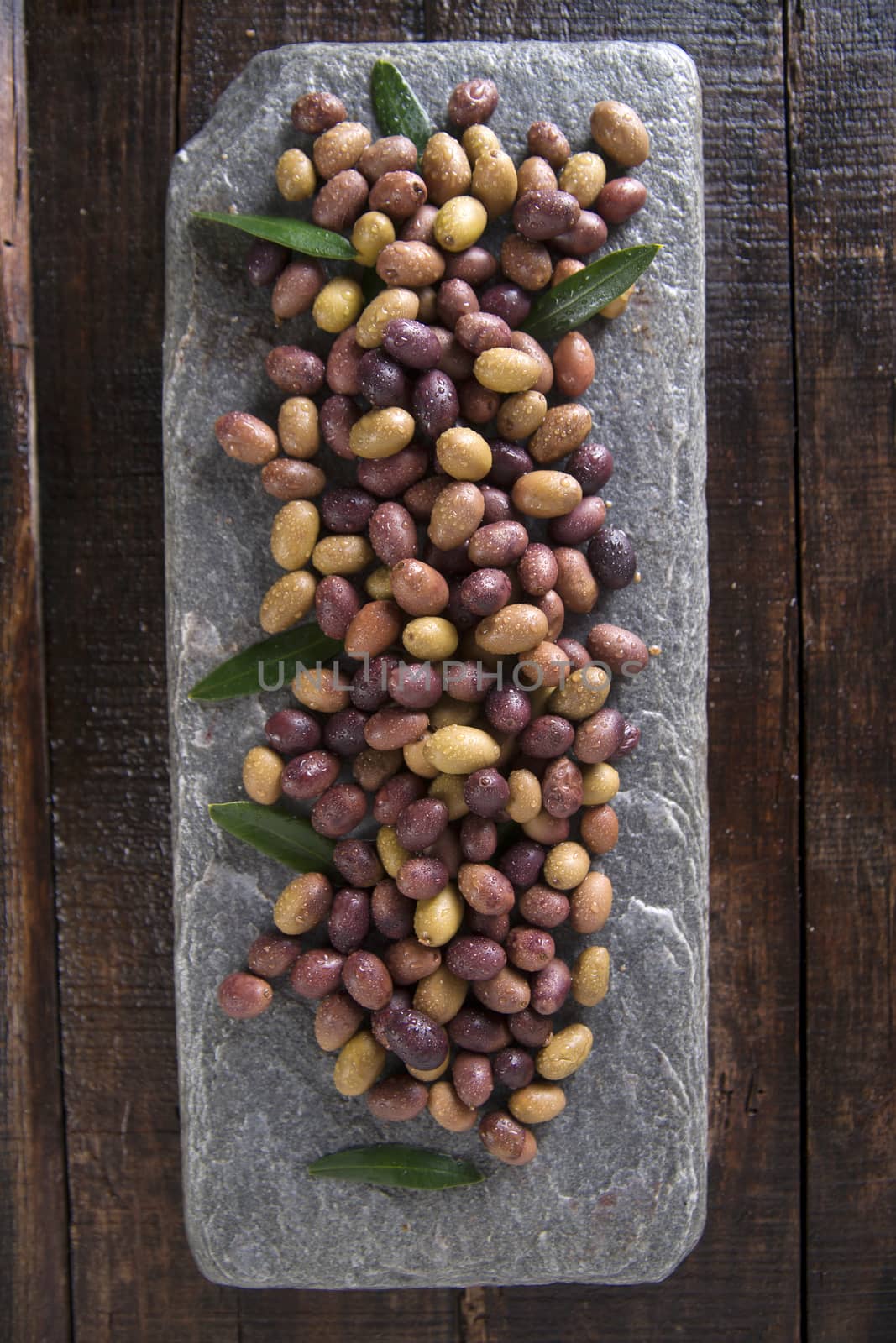 Aperitif with mixed olives in brine of Tuscany Italy