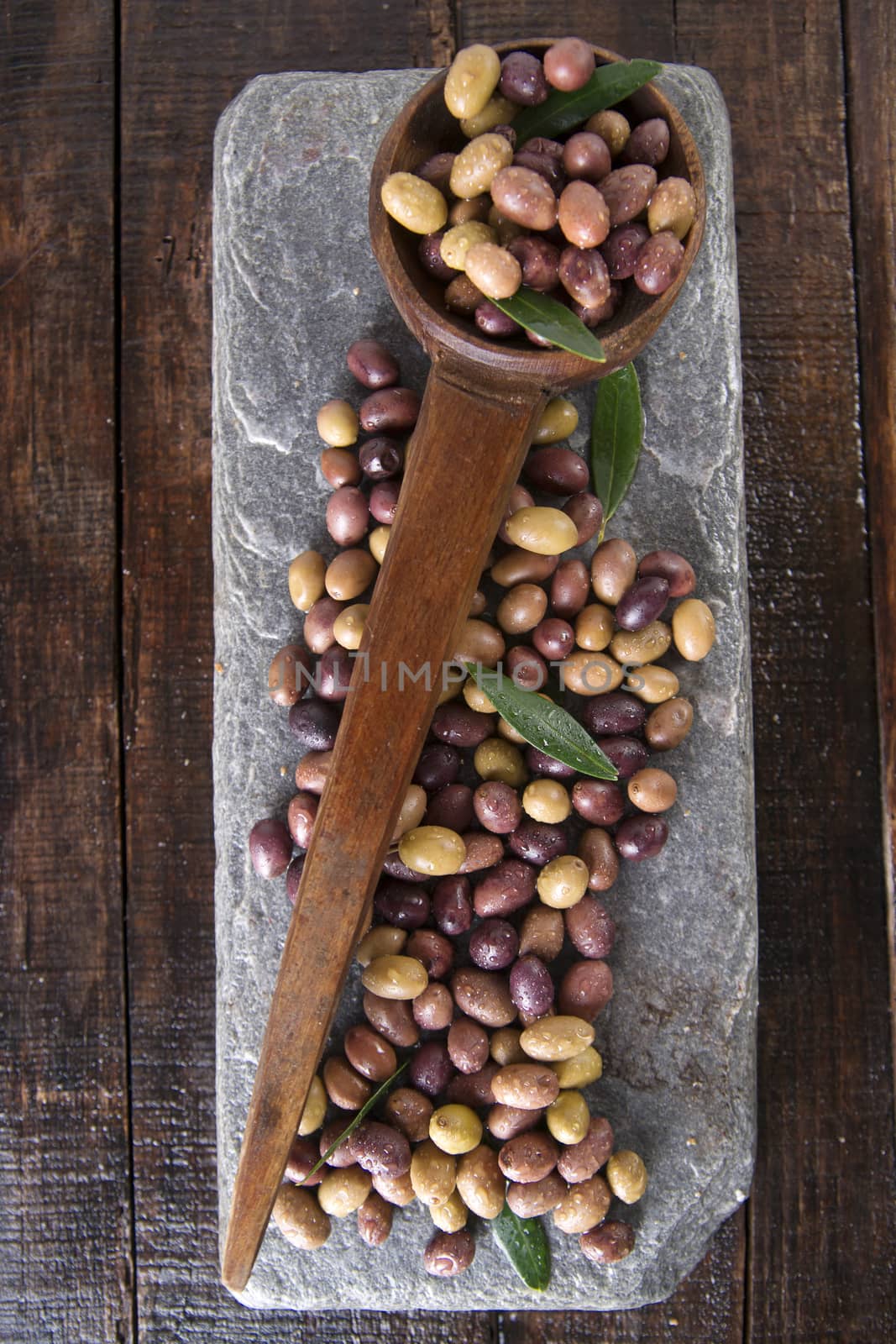 Aperitif with mixed olives in brine of Tuscany Italy