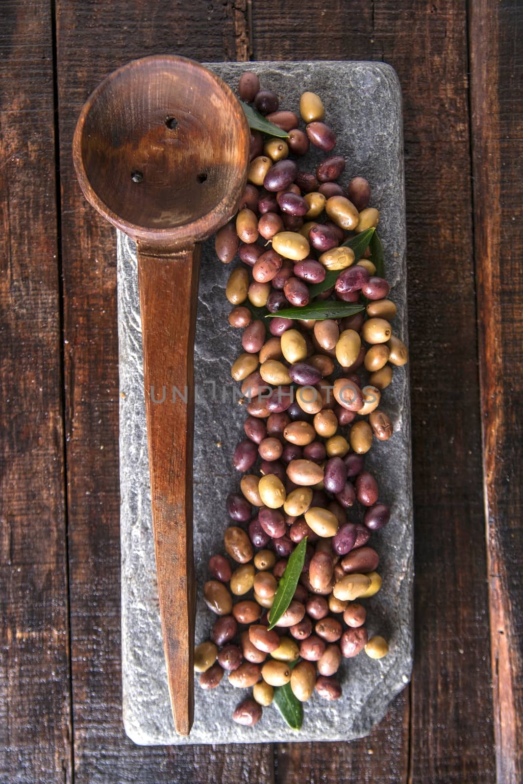 Aperitif with mixed olives in brine of Tuscany Italy