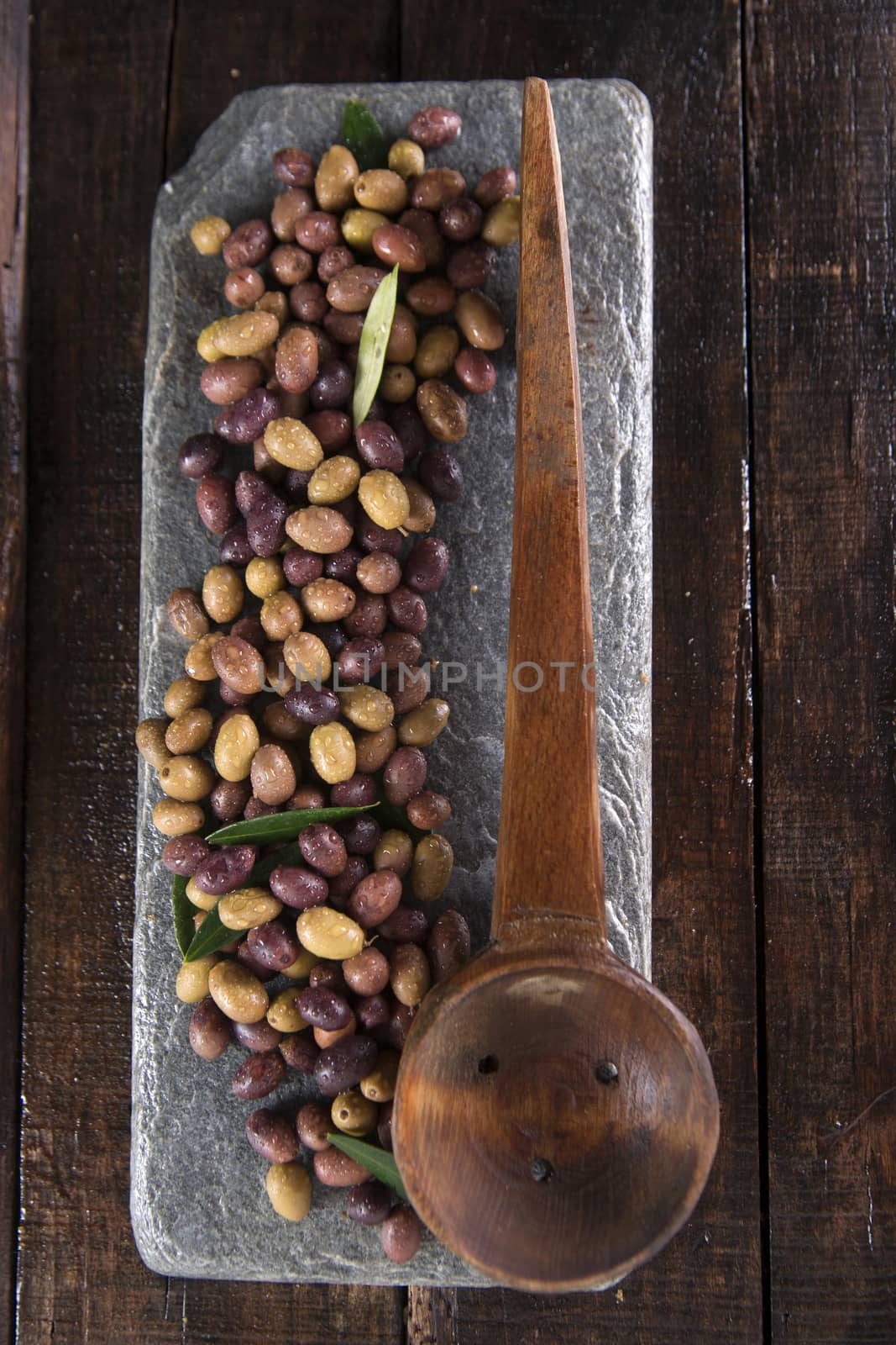 Aperitif with mixed olives in brine of Tuscany Italy