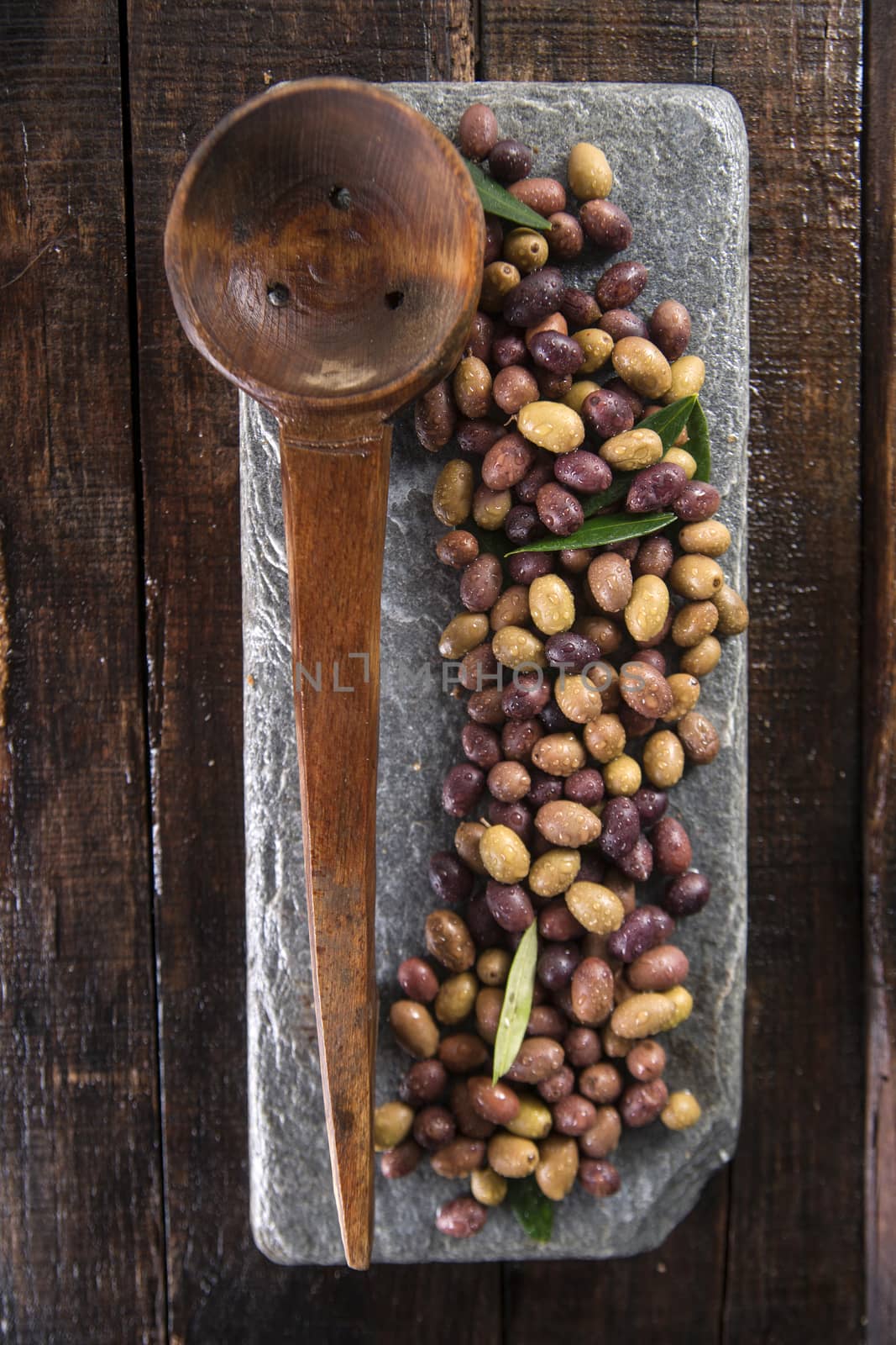 Aperitif with mixed olives in brine of Tuscany Italy