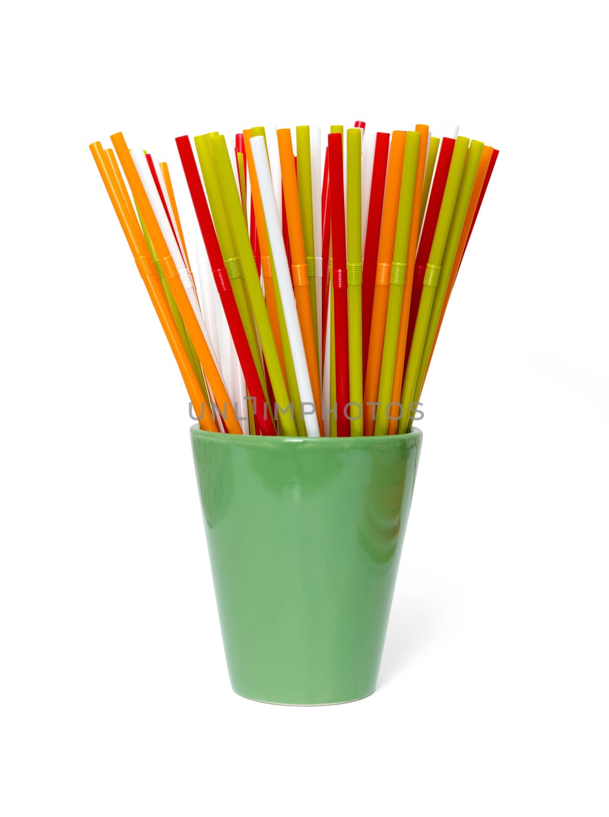 Straws for drinks in the glass. The photo on white background by DNKSTUDIO