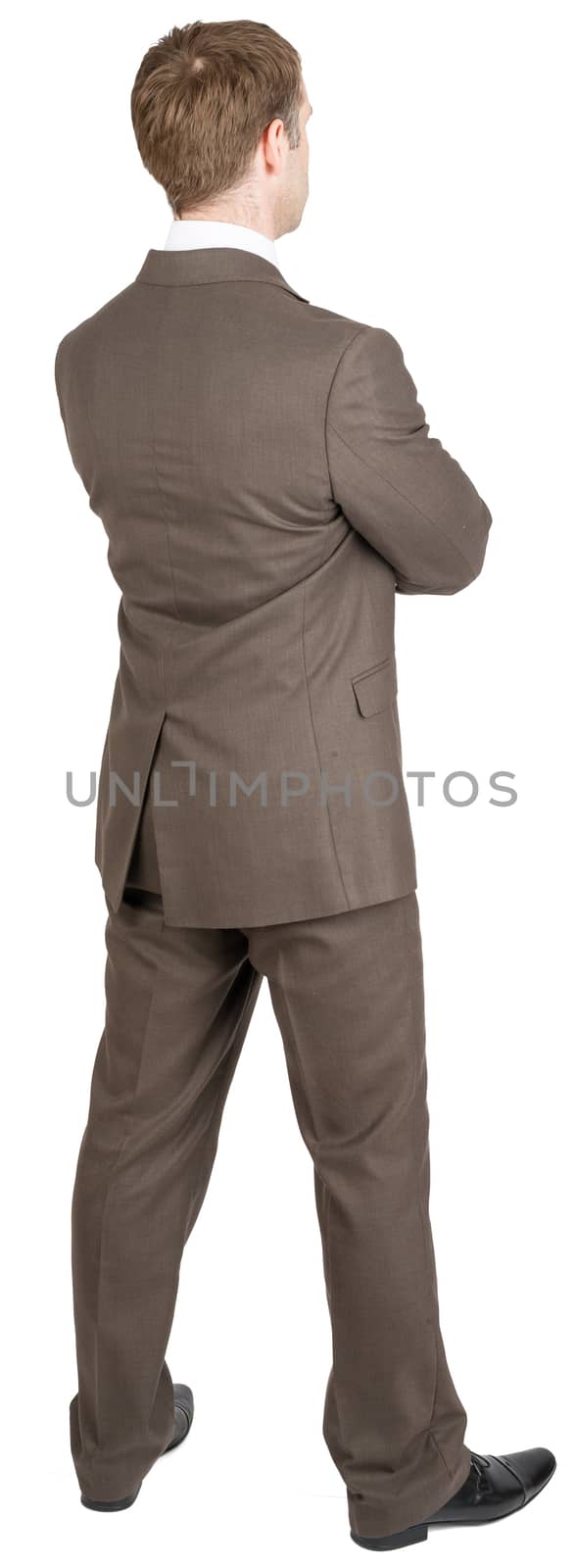 Businessman with crossed arms isolated on white background, rear view
