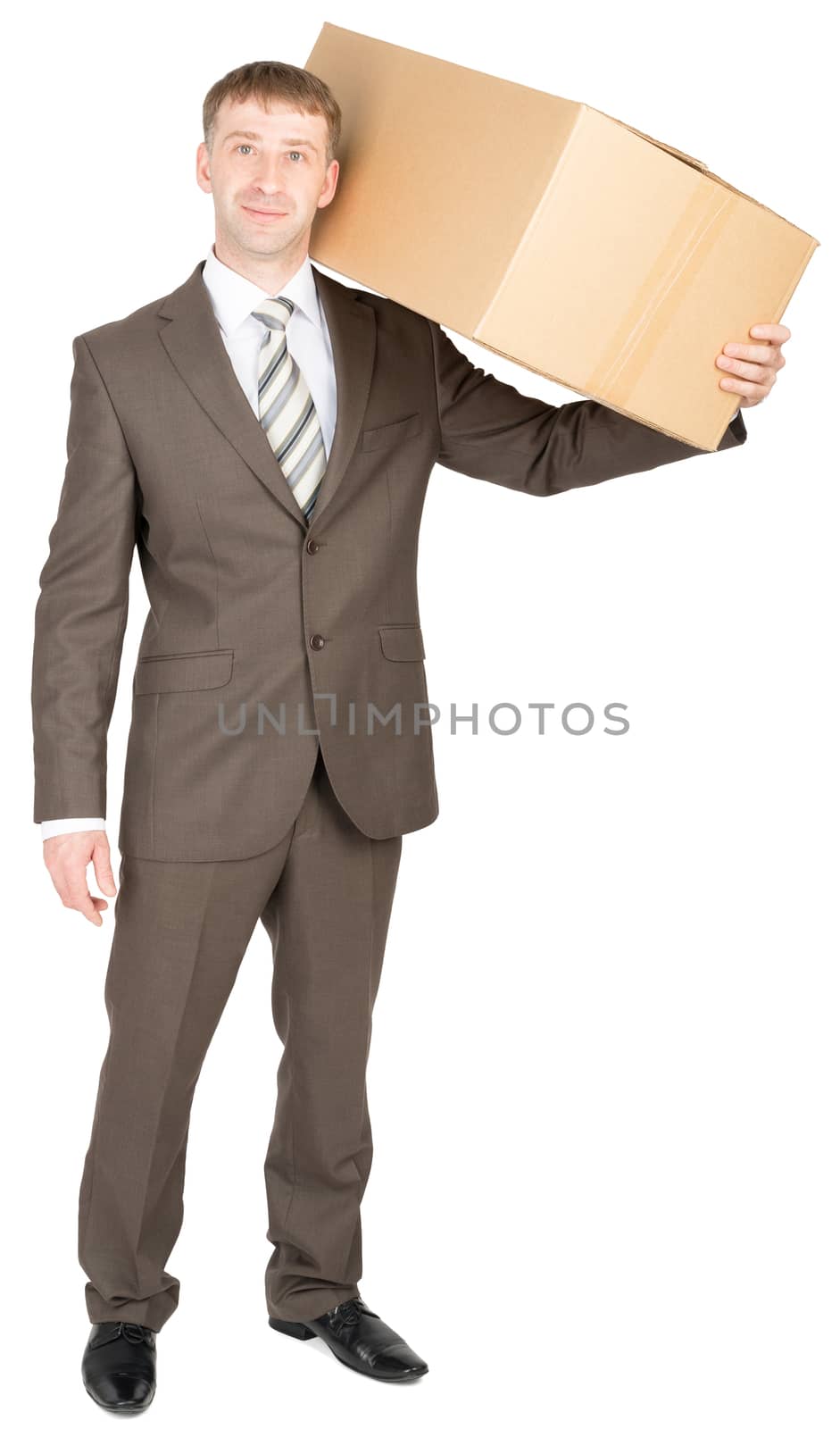 Young courier with carton box on shoulder. Looking at camera. Isolated on white background
