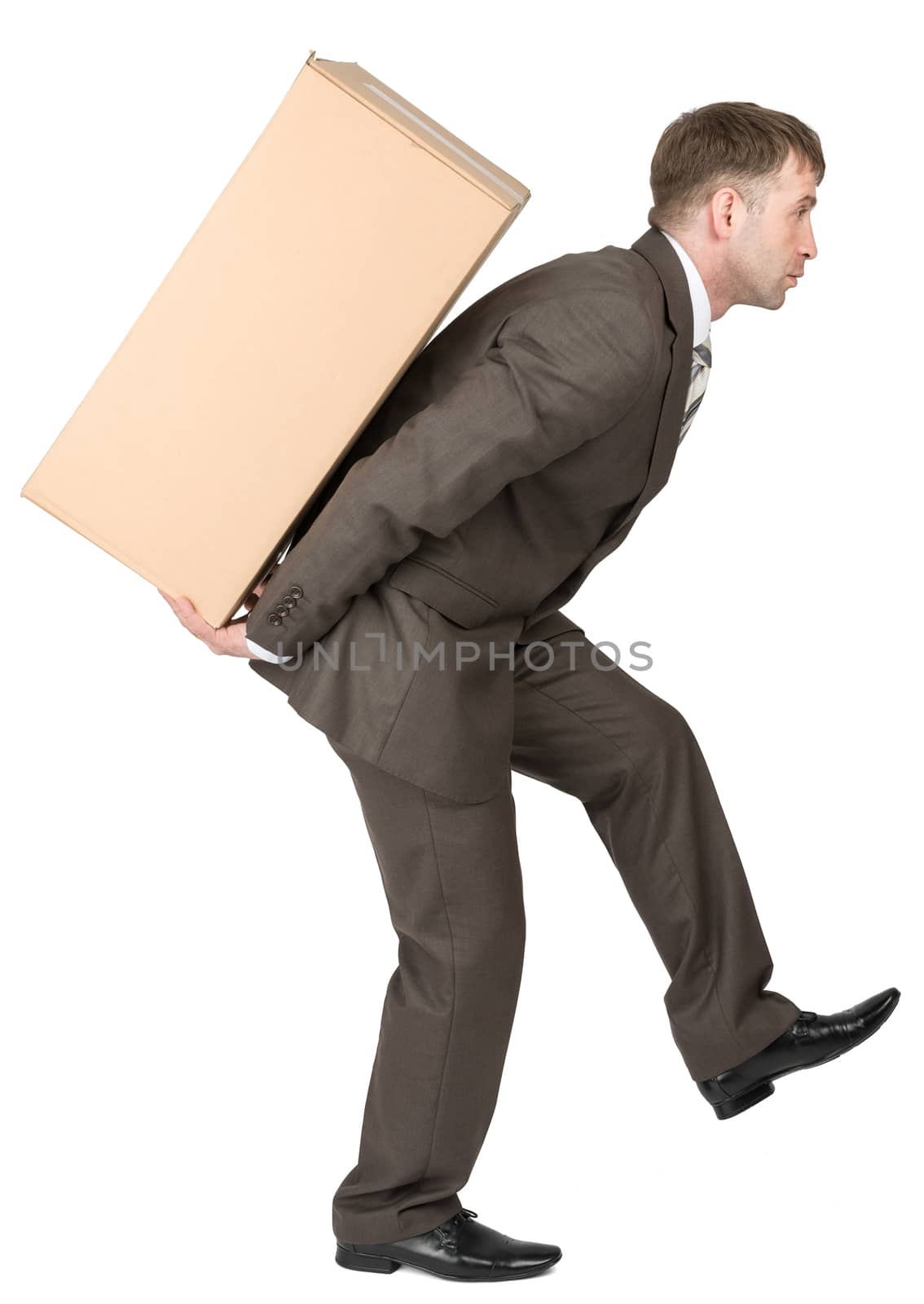 Businessman holding packages on back, looking forward. Isolated on white background
