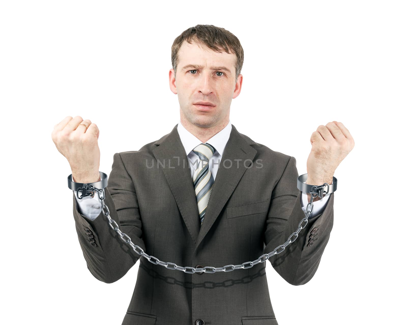 Business man wearing suit in handcuffs by cherezoff