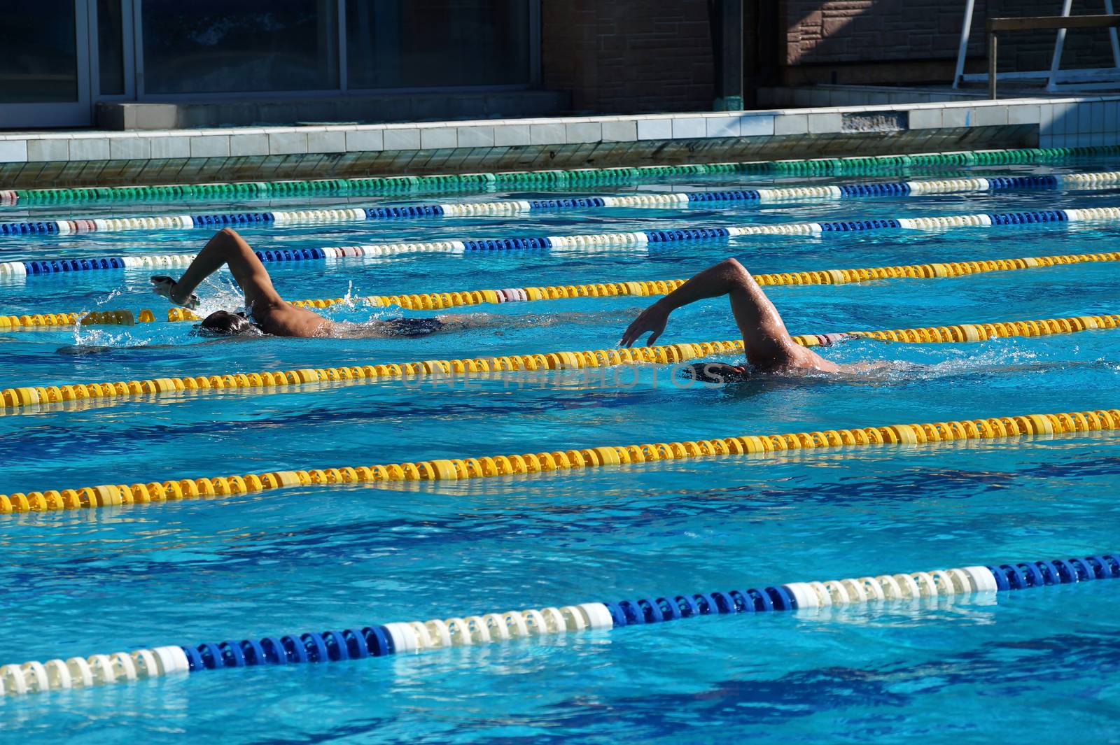 swimmer in the big outdoor swimming pool