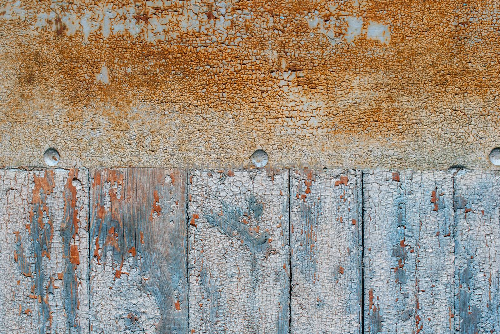 wood planks, rusty iron sheet with remnants of old paint, great background or texture for your project by uvisni