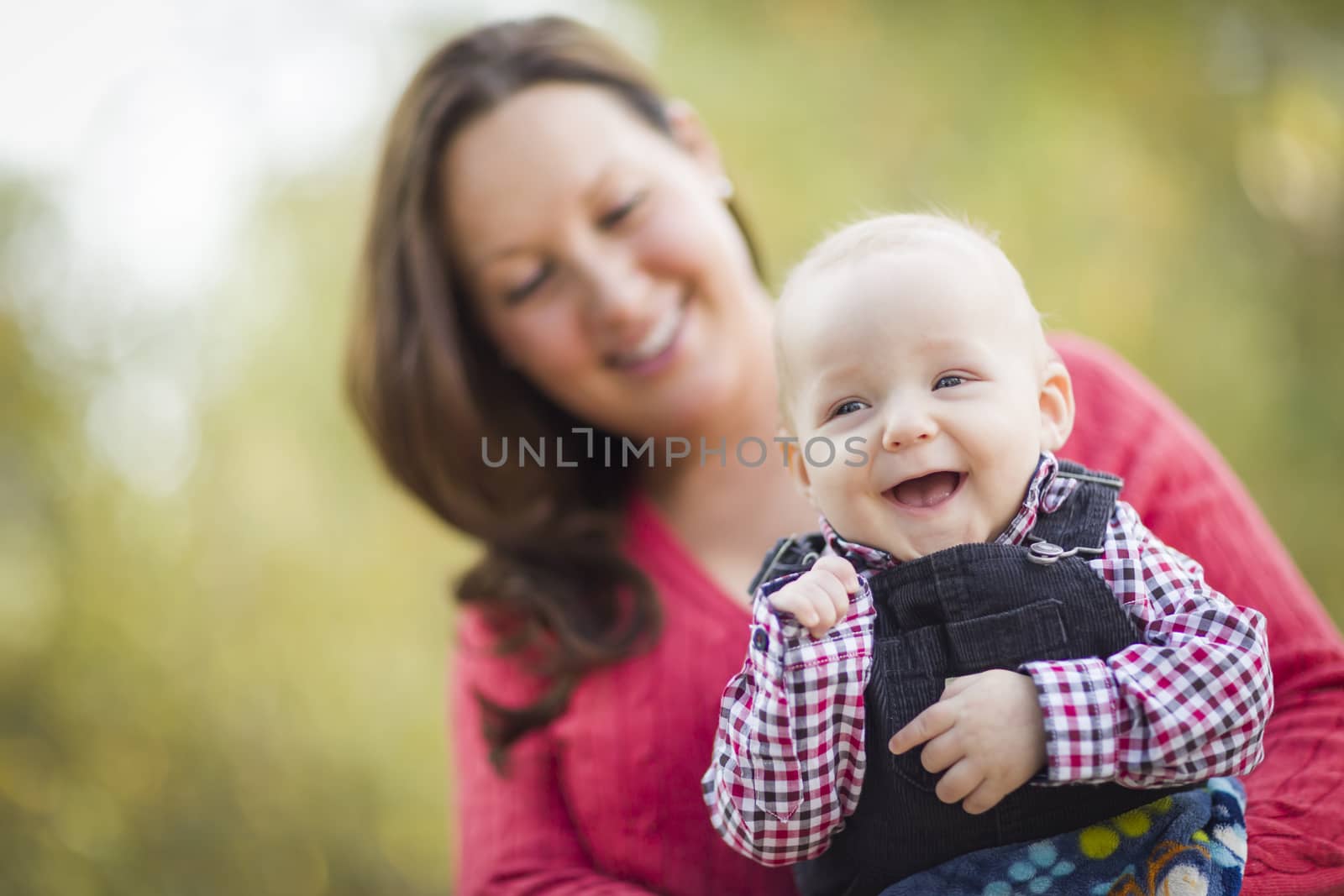 Cute Little Baby Boy Having Fun With Mommy Outdoors.