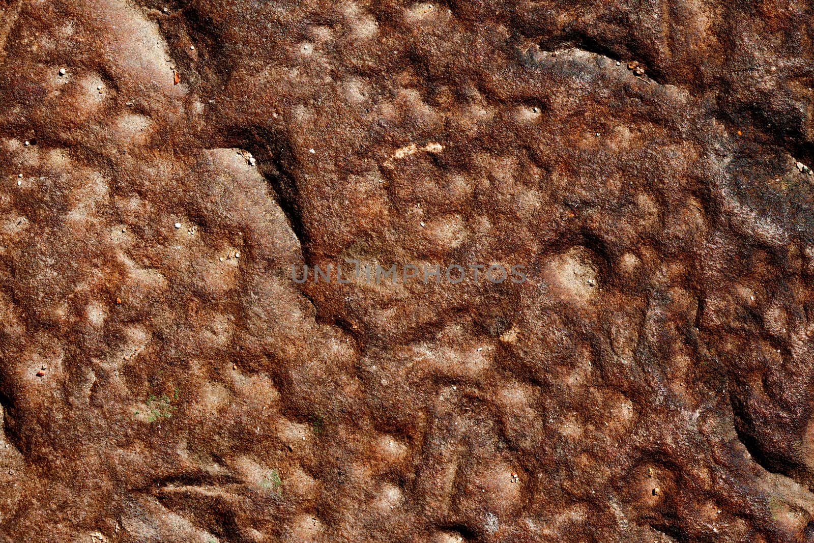 texture of stone wall with cracks and irregularities