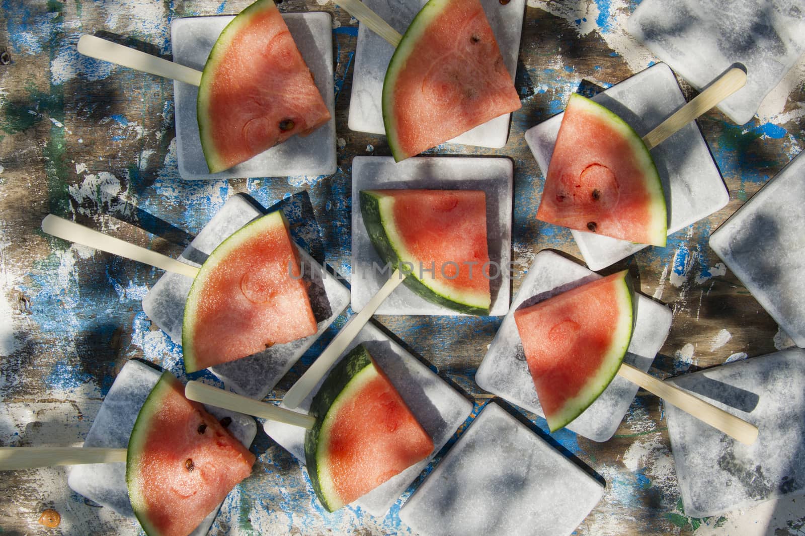 Presentation of a summer dish made up of slice of watermelon 