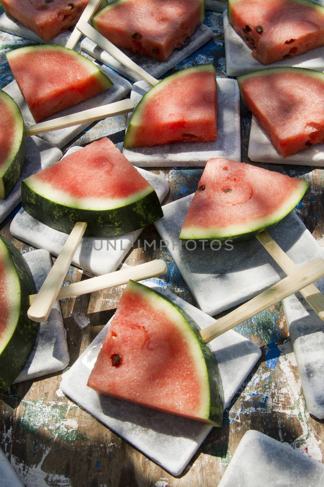 Presentation of a summer dish made up of slice of watermelon 