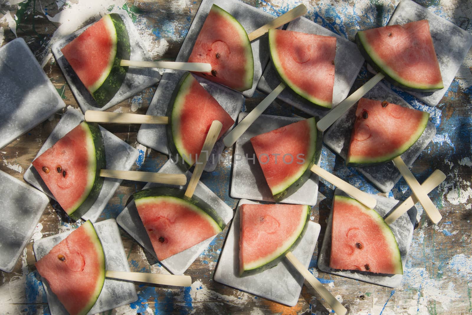 Presentation of a summer dish made up of slice of watermelon 