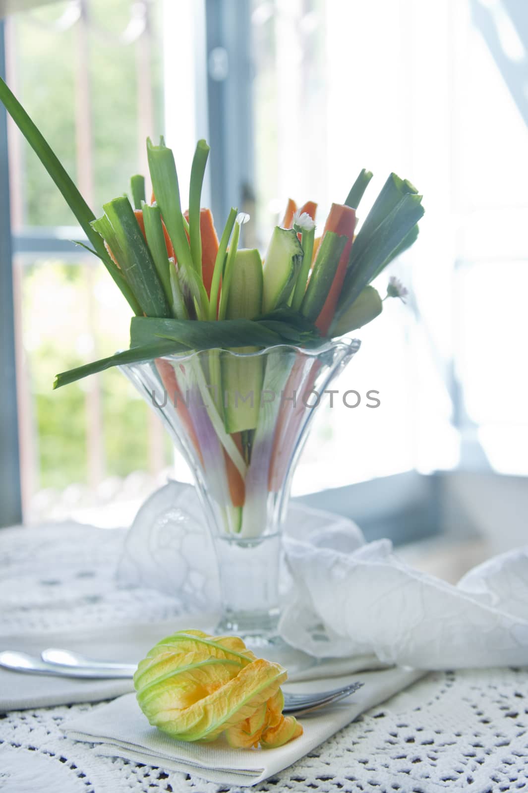 Preparation and presentation of mixed vegetables for garnish 