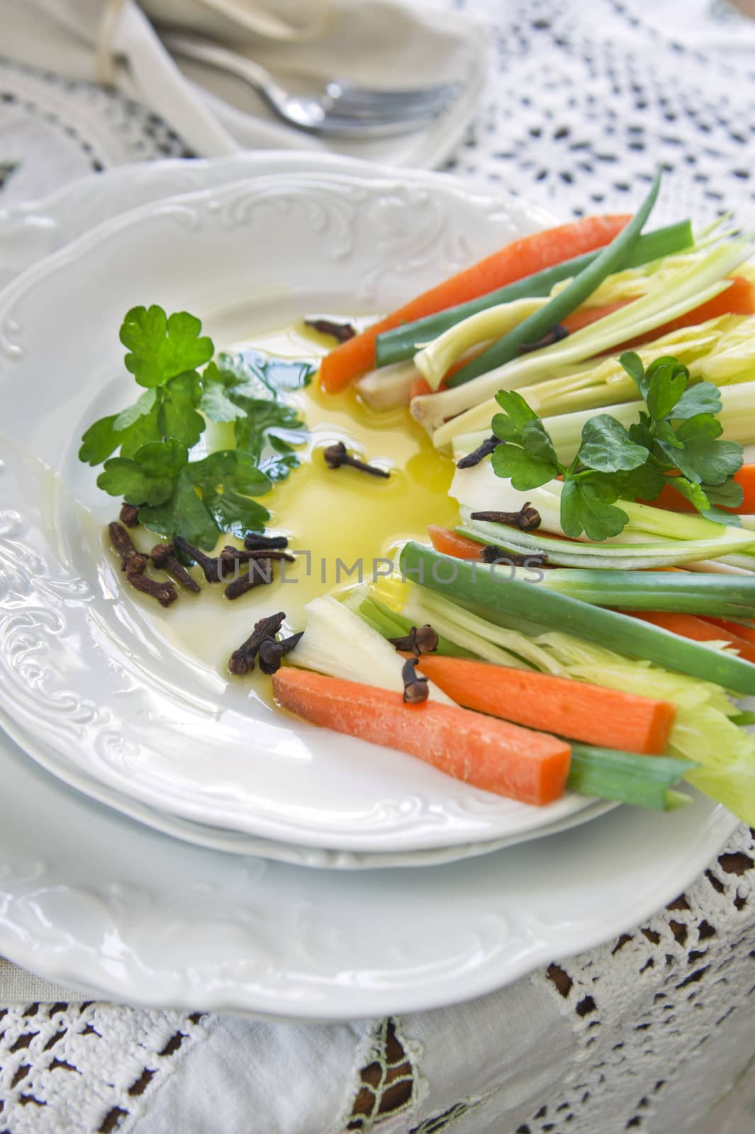 Preparation and presentation of mixed vegetables for garnish 