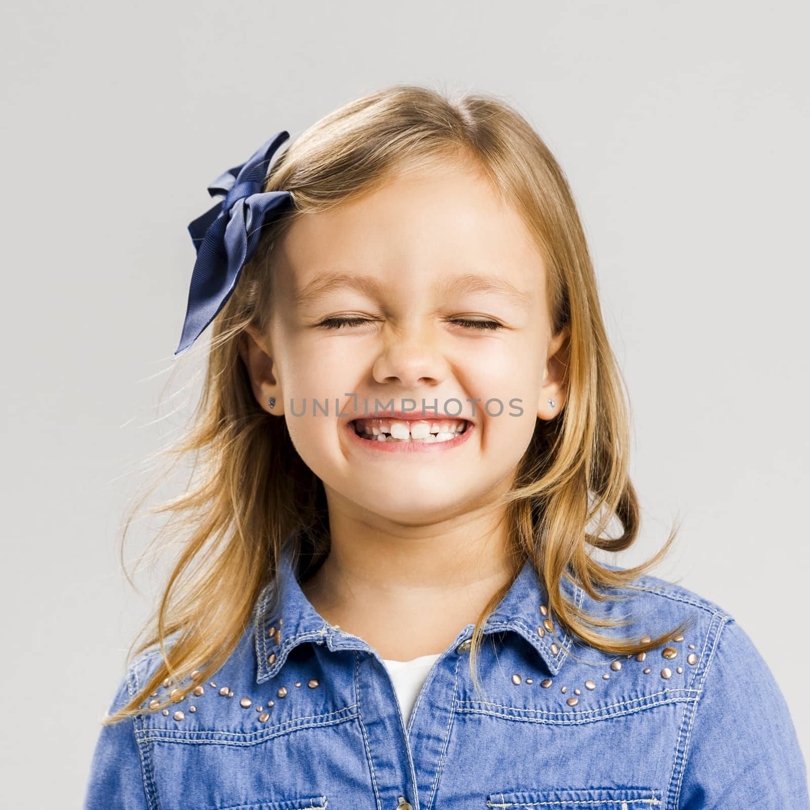 Portrait of a little girl with a smiling expression