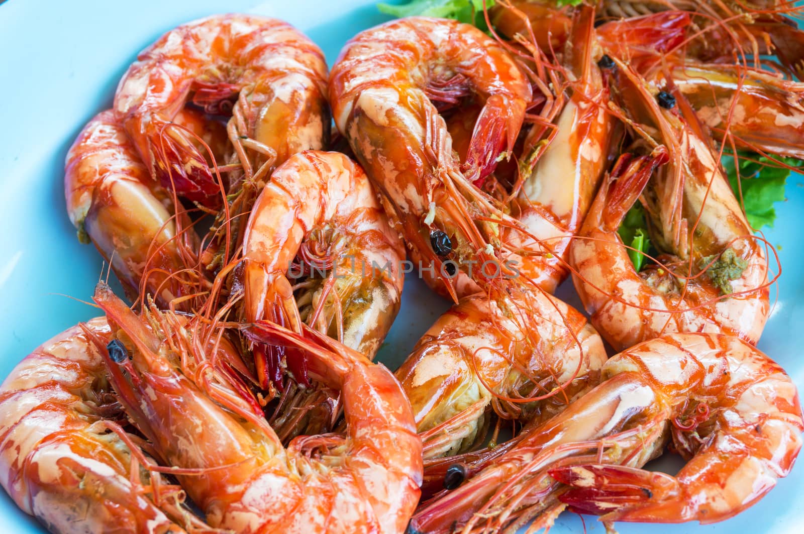 Shrimp or Prawn Baked with Salt in Plate, Closeup or Macro shot by thampapon