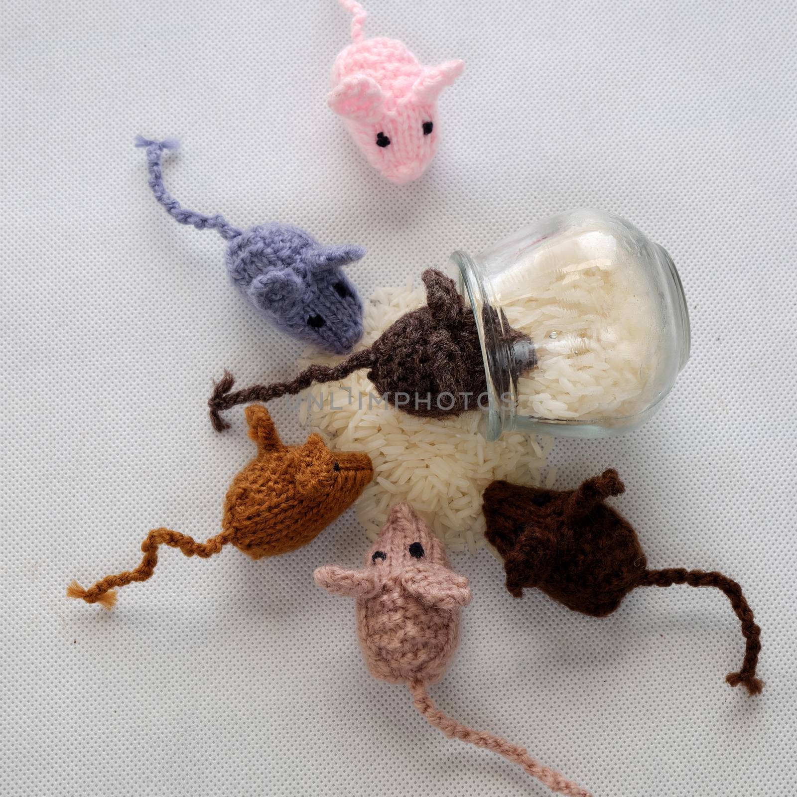 Funny concept from handmade product, group of tiny mice eat rice, amazing animals toys for kid, knitted rats knit from yarn