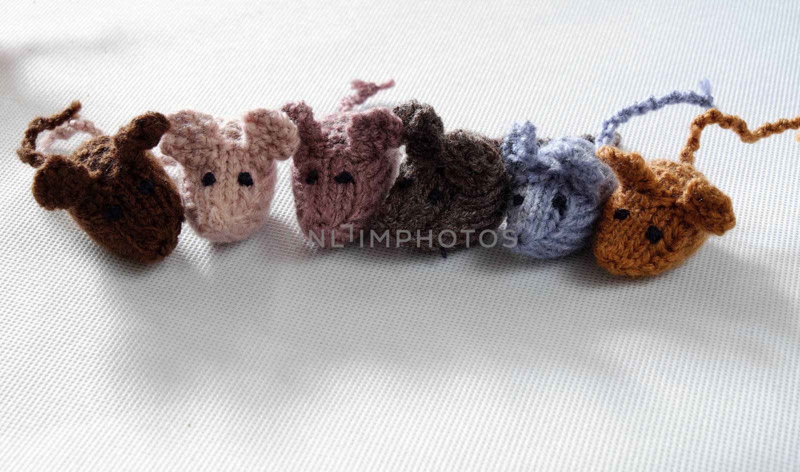 Funny concept from handmade product, group of tiny mice eat rice, amazing animals toys for kid, knitted rats knit from yarn