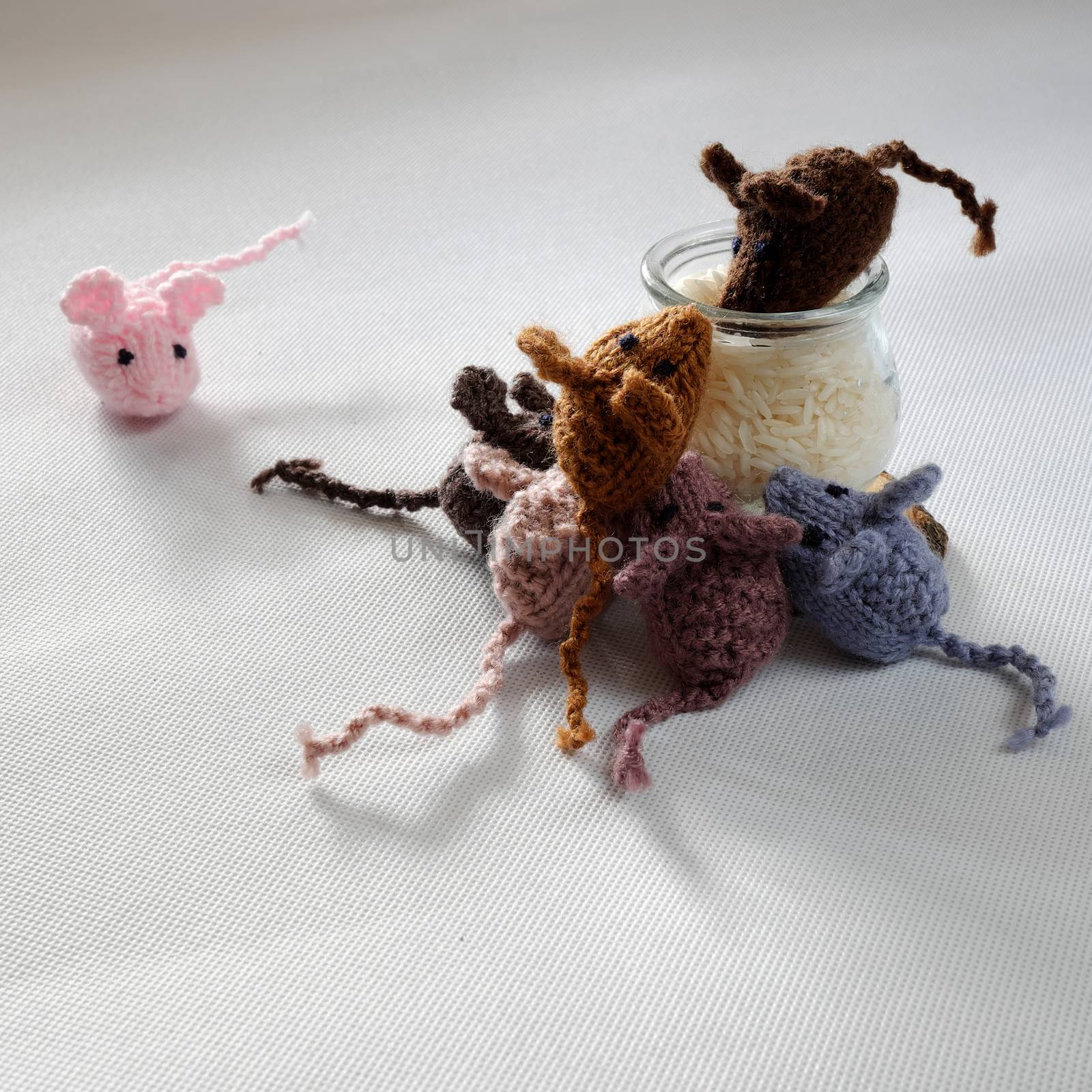 Funny concept from handmade product, group of tiny mice eat rice, amazing animals toys for kid, knitted rats knit from yarn