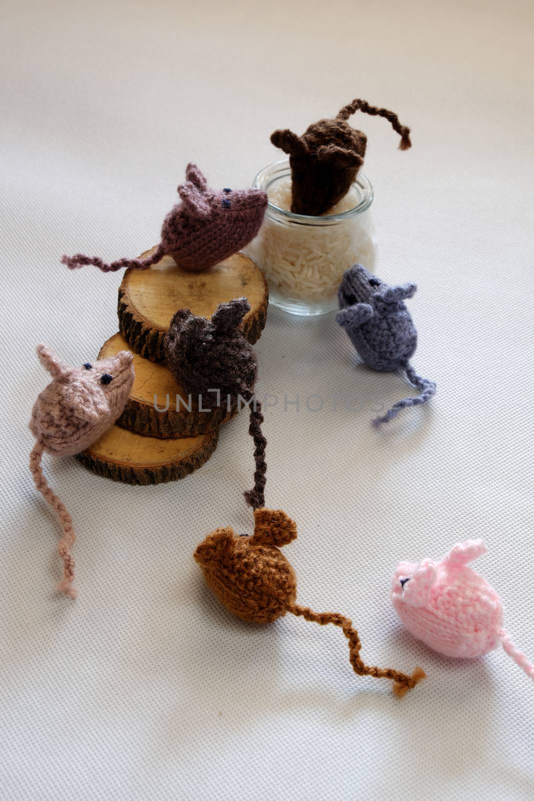 Funny concept from handmade product, group of tiny mice eat rice, amazing animals toys for kid, knitted rats knit from yarn