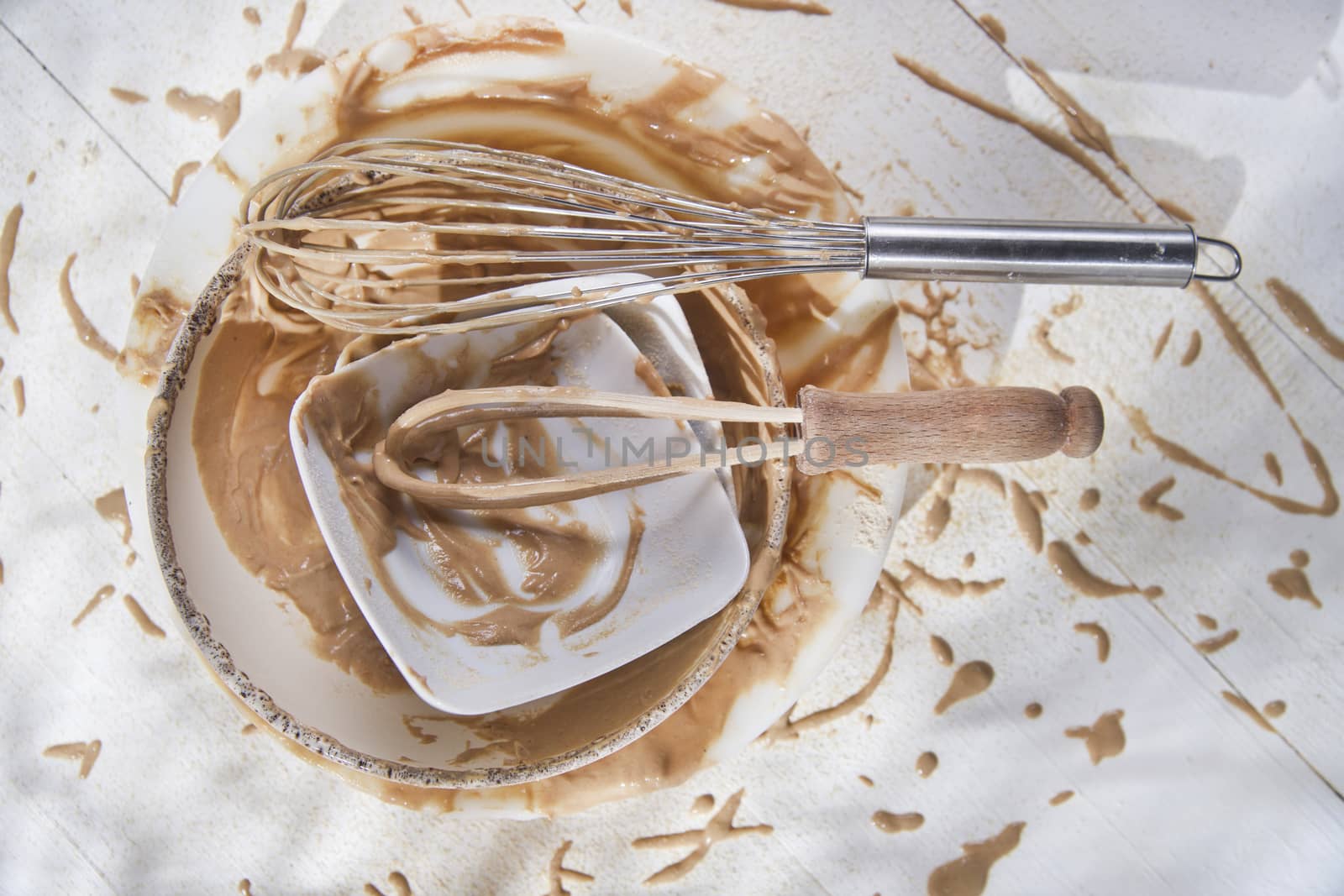 Whip and after preparation of sweet dishes by fotografiche.eu