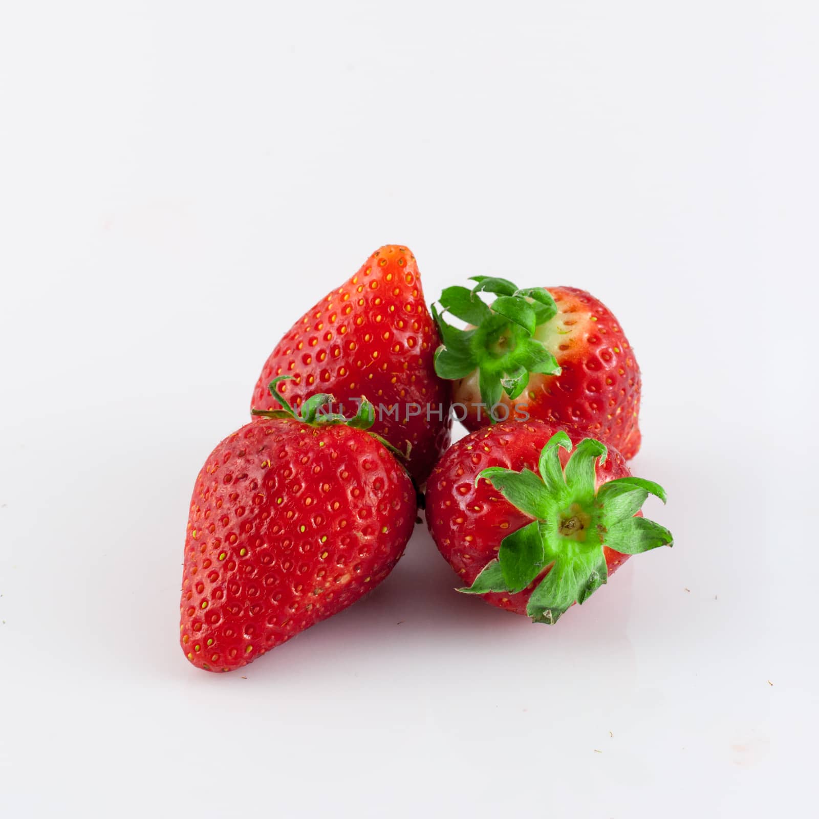 Closeup of strawberries on white background