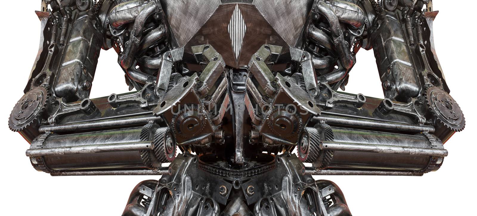 Closeup War machine sculpture made from scrap metal isolated on white background