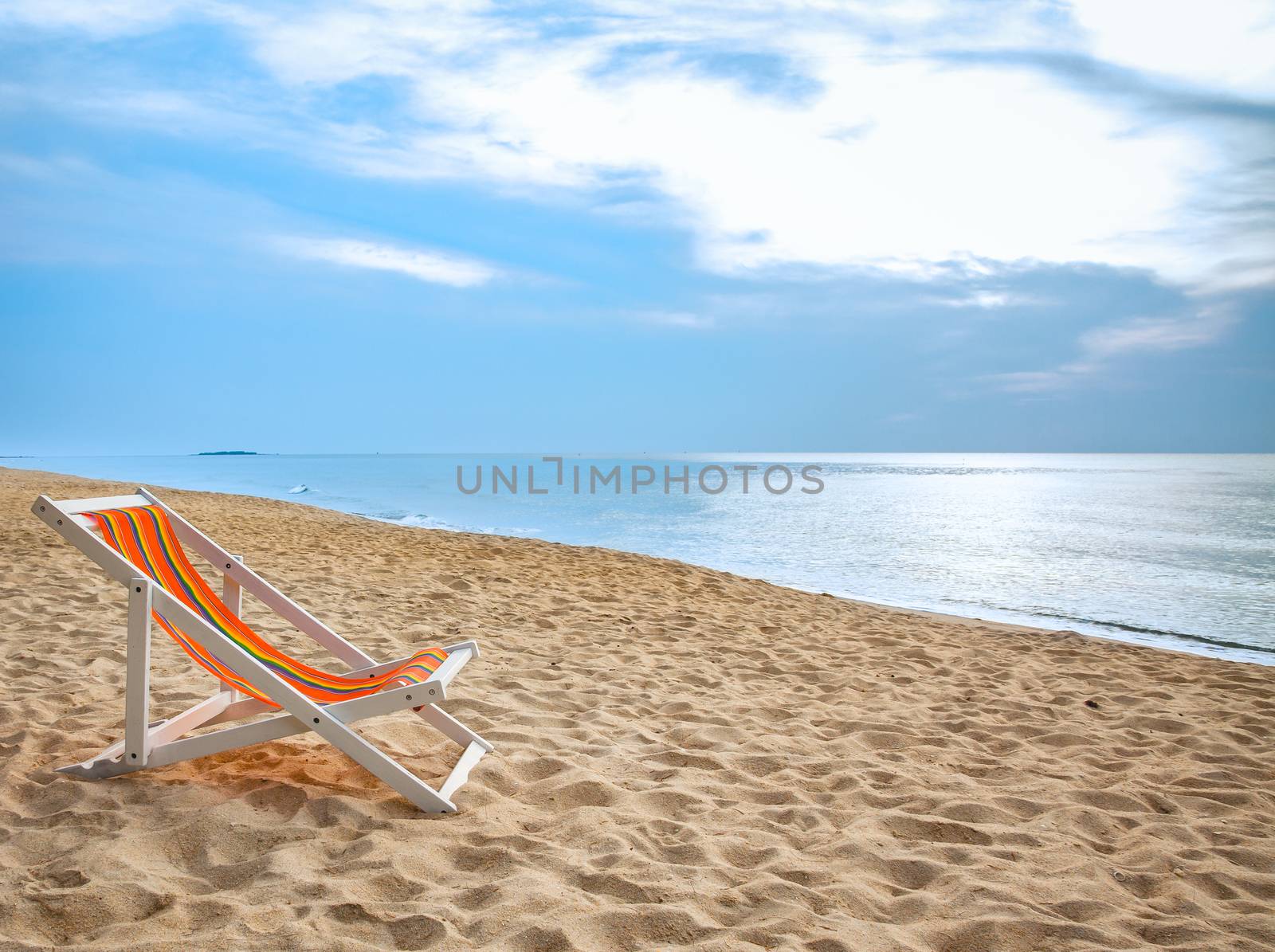 beach chair on tropical white sand by FrameAngel