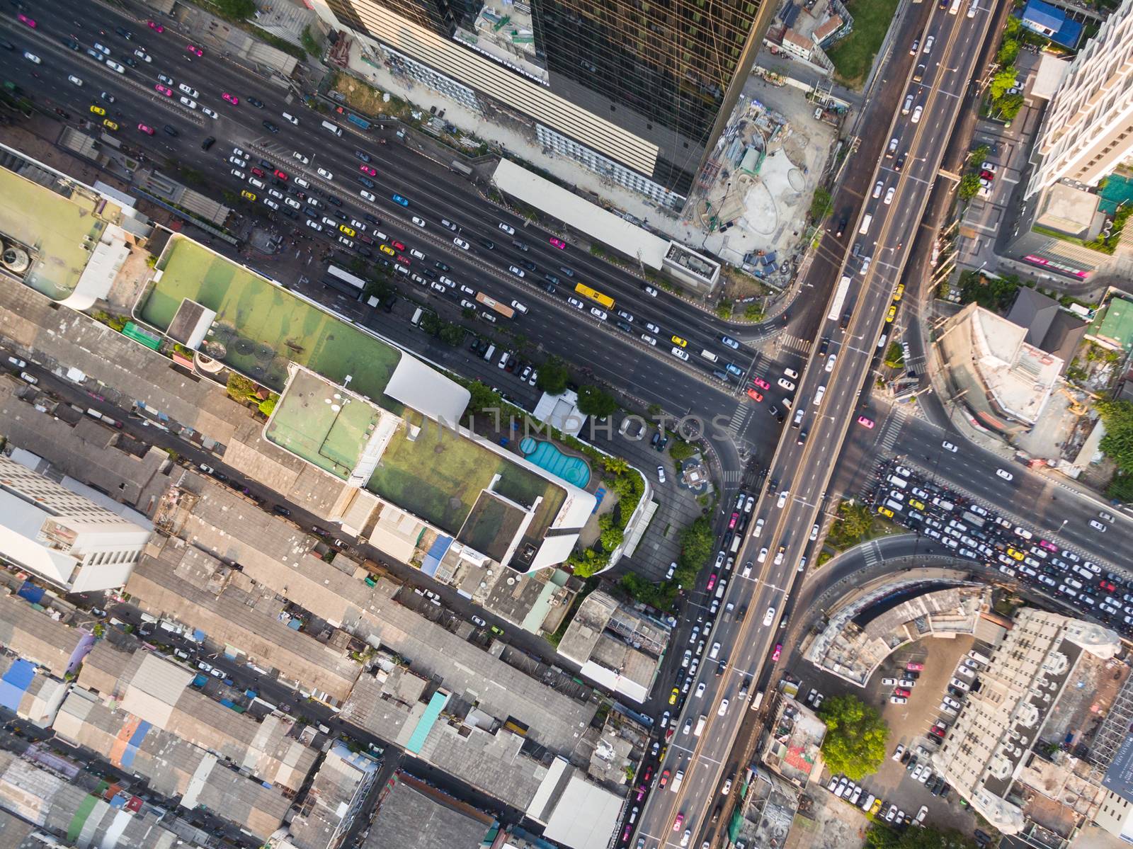 aerial view of traffic junction and transportation road in city, by FrameAngel