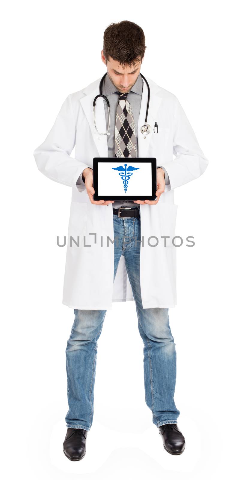 Doctor holding tablet - Caduceus symbol by michaklootwijk